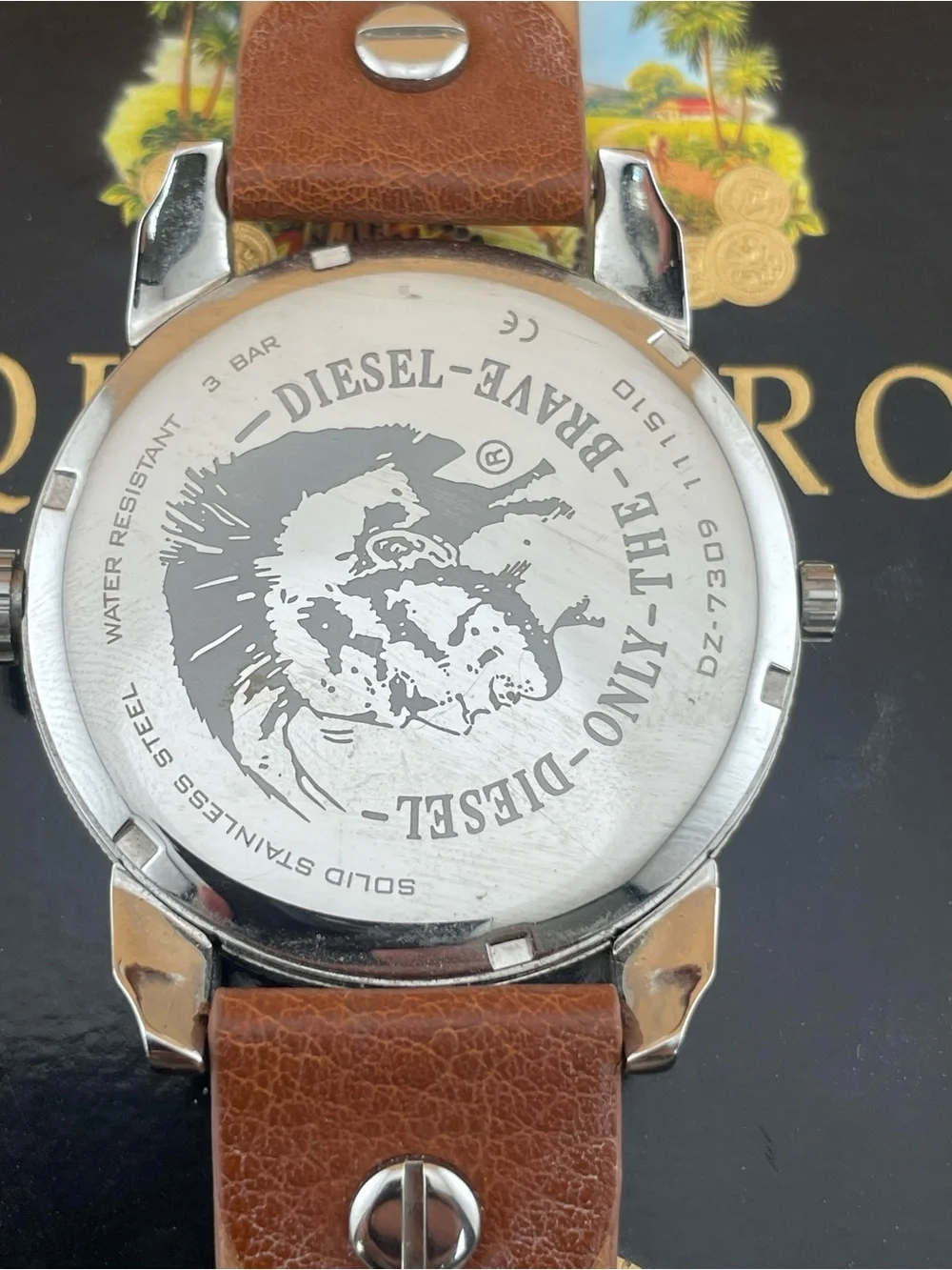 Diesel Silver Dial Watch with Orange Accents and Brown Leather Strap
